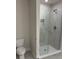 Modern bathroom featuring a glass shower and a toilet at 2214 Nw 23Rd Loop, Ocala, FL 34475