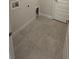 Functional laundry area with tile flooring and modern washer/dryer hookups at 2214 Nw 23Rd Loop, Ocala, FL 34475