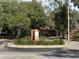 Community entrance with gated access and landscaping at 2701 Ne 10Th St # 707, Ocala, FL 34470