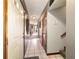 Bright hallway with tiled floor and access to stairs at 2701 Ne 10Th St # 707, Ocala, FL 34470