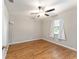 Large bedroom with wood-look floors and a ceiling fan at 43 Teak Crse, Ocala, FL 34472