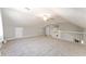 Spacious bonus room with carpet, ceiling fan and access to stairs at 43 Teak Crse, Ocala, FL 34472