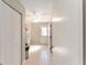 Clean hallway with tile floors and doors to other rooms at 43 Teak Crse, Ocala, FL 34472