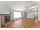 Living room with hardwood floors, fireplace, and high ceilings at 43 Teak Crse, Ocala, FL 34472