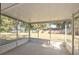 Spacious screened porch overlooking backyard at 43 Teak Crse, Ocala, FL 34472