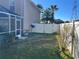 Large backyard with fenced enclosure and grassy area at 4517 Se 28Th St, Ocala, FL 34480