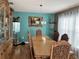 Formal dining room featuring a large wood table and matching chairs at 4517 Se 28Th St, Ocala, FL 34480