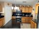 Kitchen with stainless steel appliances and granite countertops at 4517 Se 28Th St, Ocala, FL 34480