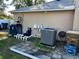 Backyard with pool pump and other equipment at 4517 Se 28Th St, Ocala, FL 34480