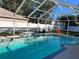 Relaxing screened pool with water features and a spacious deck at 4517 Se 28Th St, Ocala, FL 34480