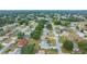 Aerial view of a quiet residential neighborhood with lush greenery at 5894 Sw 102Nd Ln, Ocala, FL 34476