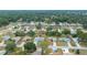 Aerial view of a residential neighborhood with a focus on one home at 5894 Sw 102Nd Ln, Ocala, FL 34476