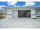 Attached garage with automatic door opener and storage at 5894 Sw 102Nd Ln, Ocala, FL 34476