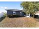 Back exterior view of house with fenced yard at 6695 Sw 64Th Ter, Ocala, FL 34476