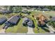 Aerial view of a residential neighborhood with houses and landscaping at 6836 Sw 179Th Court Rd, Dunnellon, FL 34432