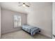 Simple bedroom with carpet floors and window with shutters at 6836 Sw 179Th Court Rd, Dunnellon, FL 34432