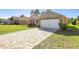 Two-car garage and paver driveway at 6836 Sw 179Th Court Rd, Dunnellon, FL 34432