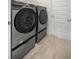 Laundry room with modern Samsung washer and dryer at 6836 Sw 179Th Court Rd, Dunnellon, FL 34432