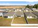 Aerial view of houses with fenced backyards at 7094 Sw 60Th Ln, Ocala, FL 34474