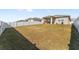 Spacious backyard with grassy area and privacy fence at 7094 Sw 60Th Ln, Ocala, FL 34474