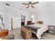 Bright bedroom with a comfy bed and ensuite bathroom at 7094 Sw 60Th Ln, Ocala, FL 34474