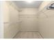 Large walk-in closet with wire shelving provides ample storage space at 8681 Sw 93Rd Pl # B, Ocala, FL 34481