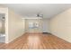 Bright living room featuring wood floors and ceiling fan at 8681 Sw 93Rd Pl # B, Ocala, FL 34481