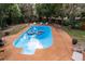 Refreshing blue swimming pool in a spacious backyard at 900 Mulberry St, Fruitland Park, FL 34731