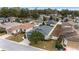 Aerial view of a charming house in a residential neighborhood at 1065 Ne 31St Ter, Ocala, FL 34470