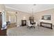 Elegant dining room with chandelier and hardwood floors at 1065 Ne 31St Ter, Ocala, FL 34470