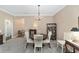 Bright dining room featuring a round table and chandelier at 1065 Ne 31St Ter, Ocala, FL 34470