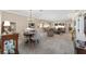 Open-concept living space connecting the dining and living areas for seamless flow at 1065 Ne 31St Ter, Ocala, FL 34470