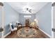 Comfortable sitting room with hardwood floors, a ceiling fan and relaxing decor at 1065 Ne 31St Ter, Ocala, FL 34470