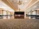 Grand ballroom with a dance floor, stage and chandeliers at 10801 Sw 71St Ave, Ocala, FL 34476