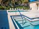 Relaxing spa and pool area with lounge chairs at 10801 Sw 71St Ave, Ocala, FL 34476