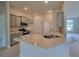 Modern kitchen with gray cabinets and large kitchen island at 12238 Sw 85Th Pl, Dunnellon, FL 34432