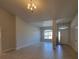 Open living room with high ceilings and natural light at 13392 Sw 33Rd Ct, Ocala, FL 34473