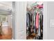 Well-organized closet with hanging rods and shoe storage at 19586 Sw 84Th Pl, Dunnellon, FL 34432