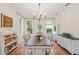 Elegant dining room featuring a chandelier and hardwood floors at 19586 Sw 84Th Pl, Dunnellon, FL 34432