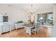 Bright dining room with French doors leading to the patio at 19586 Sw 84Th Pl, Dunnellon, FL 34432