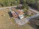 Aerial view showcasing house and driveway at 20635 Sw 63Rd Pl, Dunnellon, FL 34431