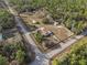 Property boundaries highlighted in an aerial view at 20635 Sw 63Rd Pl, Dunnellon, FL 34431