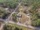 Aerial view of the house and surrounding area at 20635 Sw 63Rd Pl, Dunnellon, FL 34431