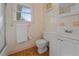 Bathroom with white vanity, toilet and shower/tub combo at 20635 Sw 63Rd Pl, Dunnellon, FL 34431