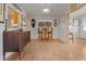 Charming dining area with hardwood floors and antique furniture at 20635 Sw 63Rd Pl, Dunnellon, FL 34431