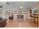 Bright dining area with hardwood floors, antique furniture and a view to kitchen at 20635 Sw 63Rd Pl, Dunnellon, FL 34431