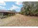 Landscaped backyard with privacy and open space at 21590 Sw 84Th Loop, Dunnellon, FL 34431