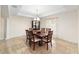 Well lit dining area with tile floors and neutral colors at 21590 Sw 84Th Loop, Dunnellon, FL 34431