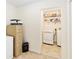 Laundry room with washer, dryer, and shelving at 21590 Sw 84Th Loop, Dunnellon, FL 34431