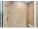 Clean shower with tiled walls and built-in seat at 21590 Sw 84Th Loop, Dunnellon, FL 34431